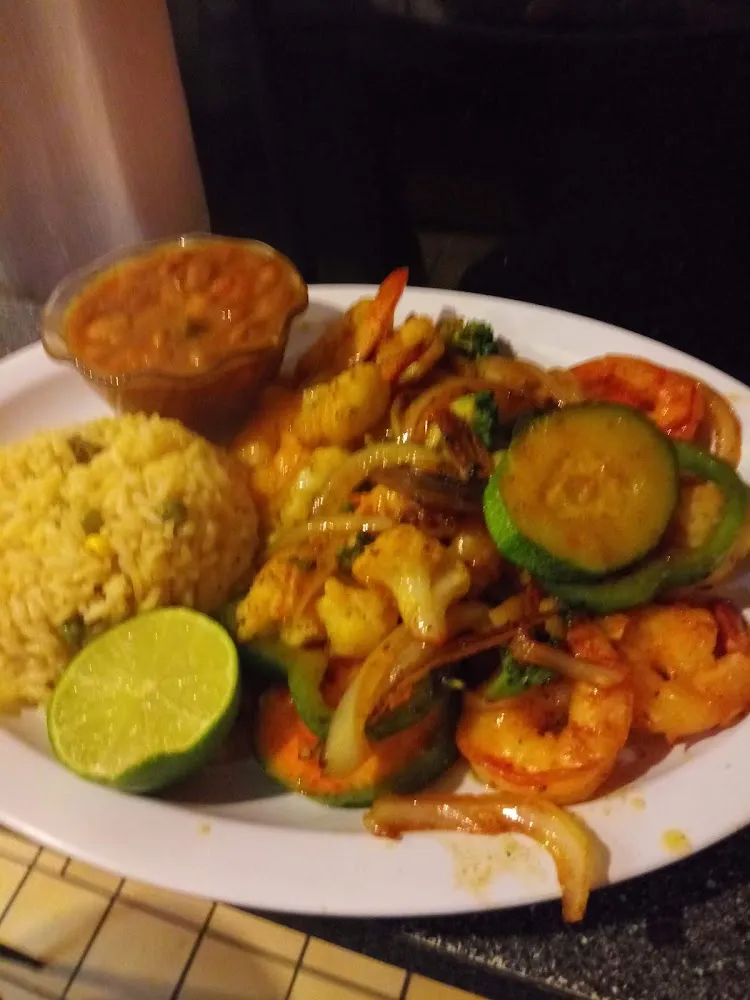 Camaromes Picantes Con Arroz
